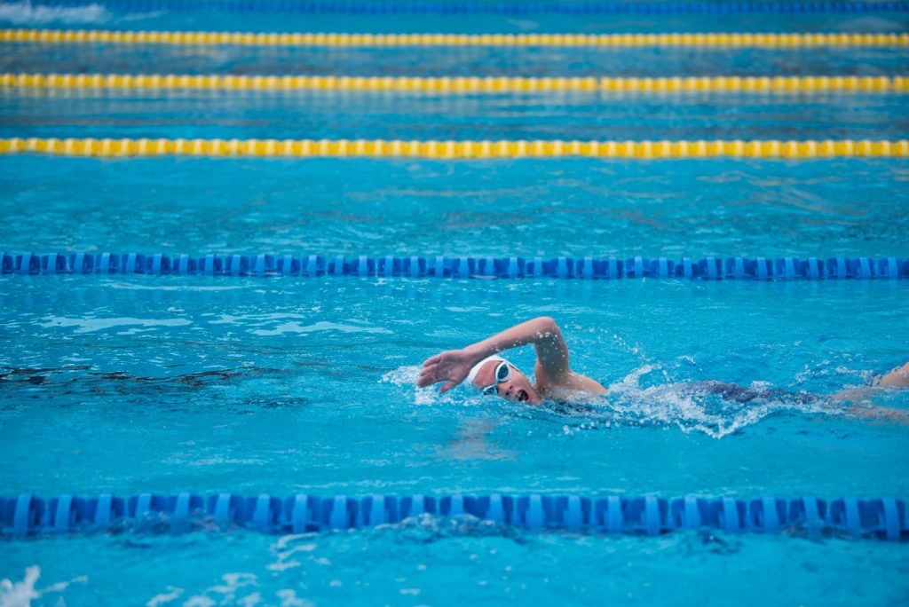 woman swimming on pool